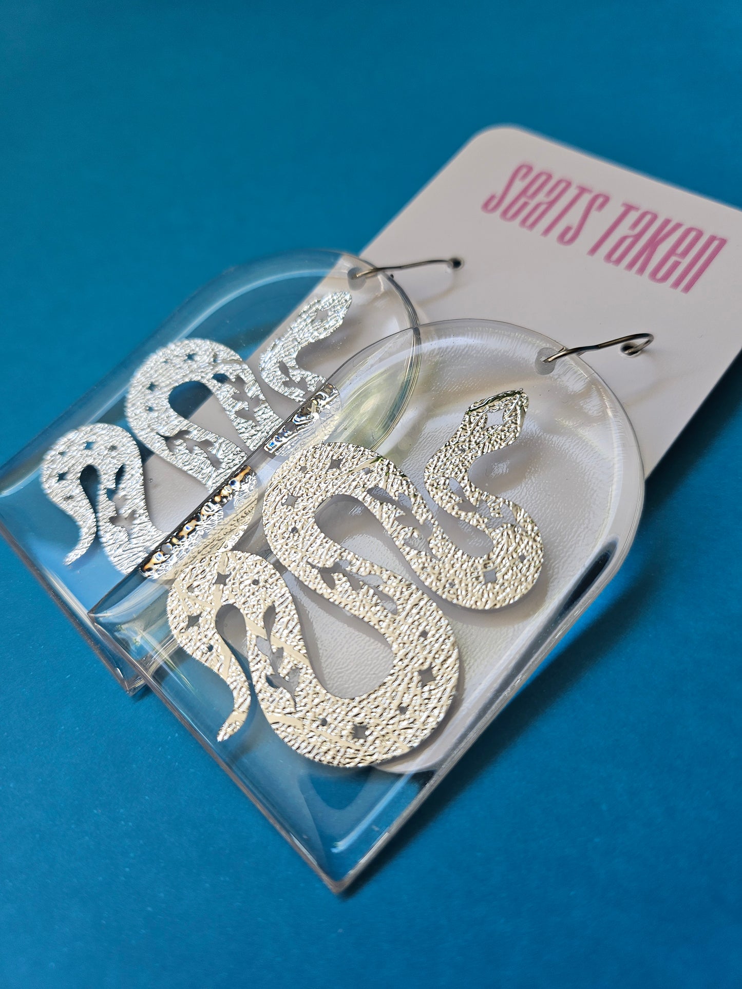 Snake arch hook dangles