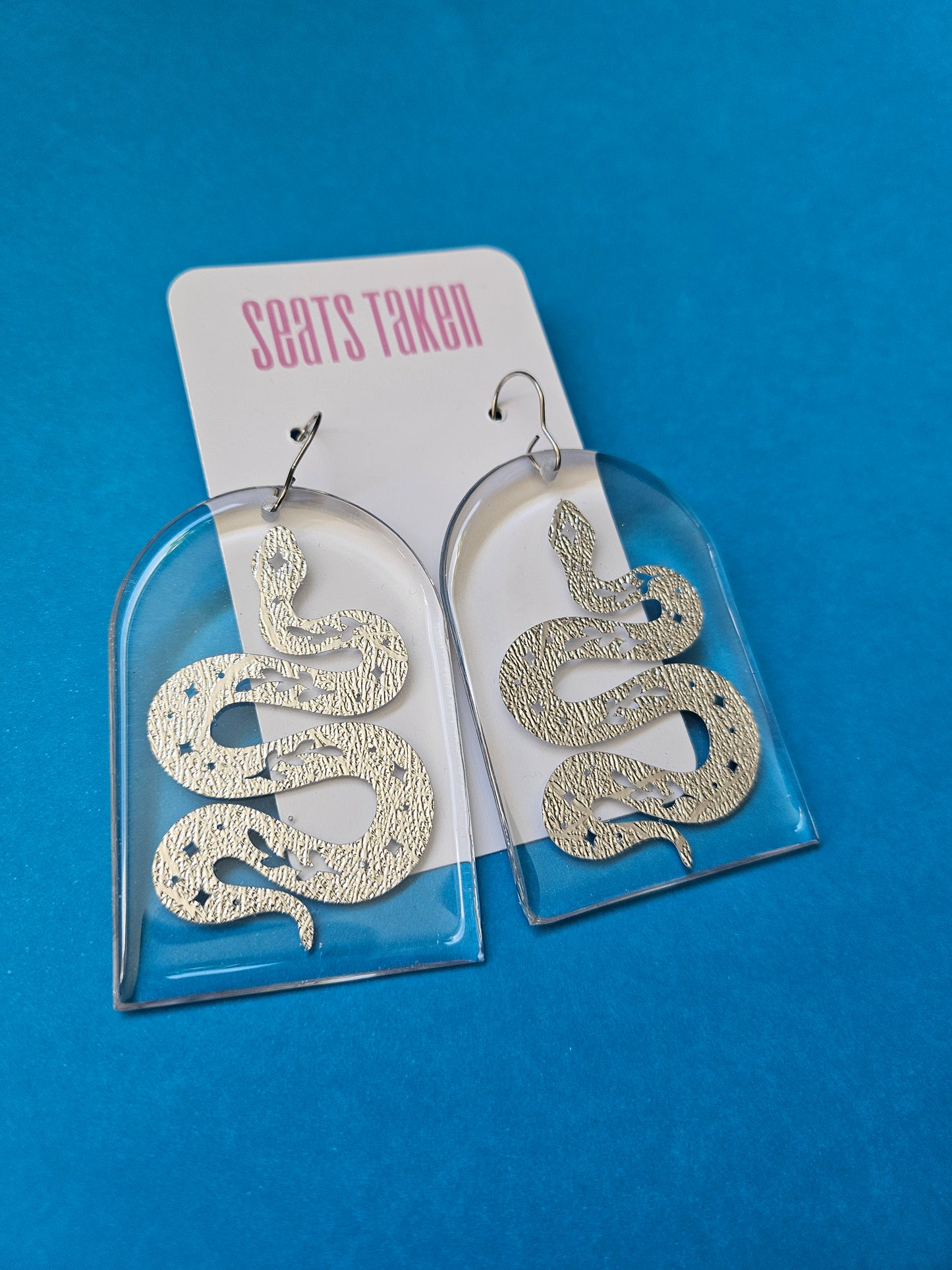 Snake arch hook dangles